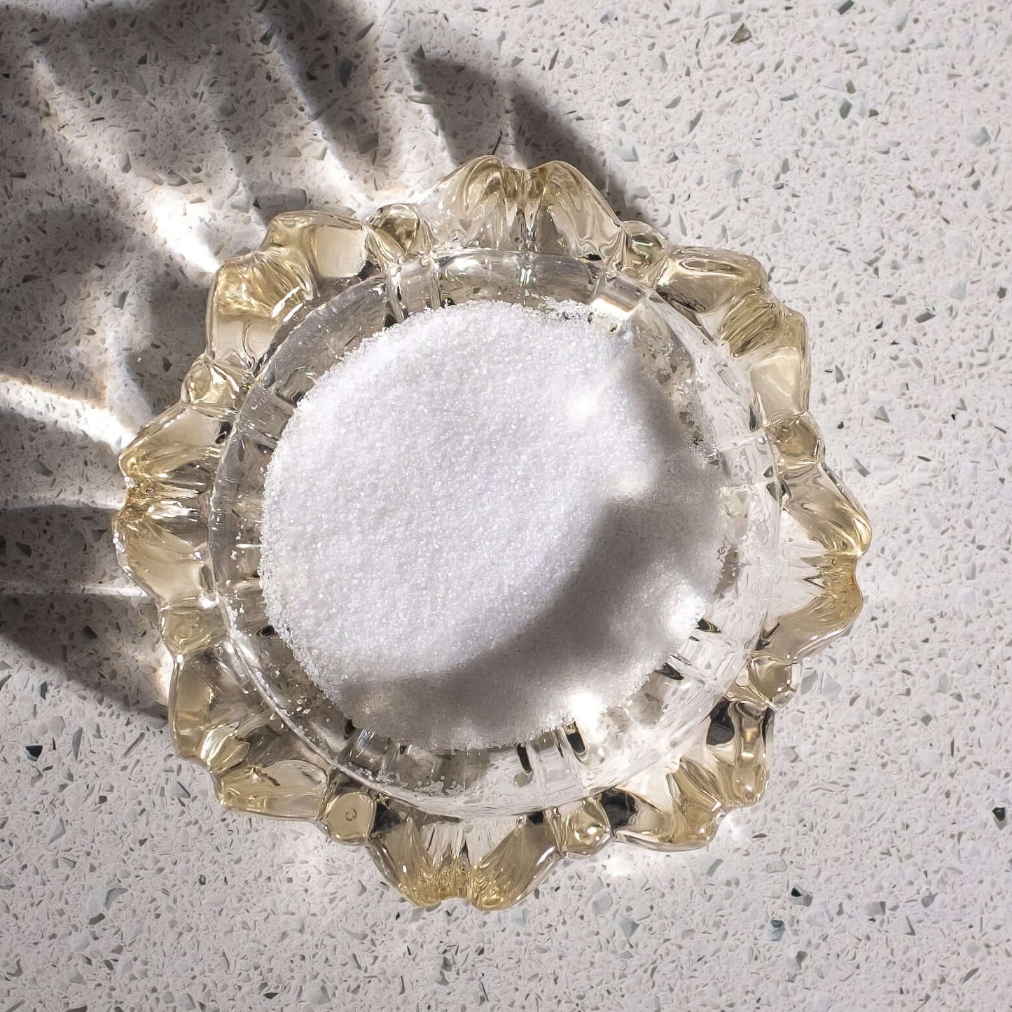 Granulated citric acid for topping popcorn, close up to show grain size.