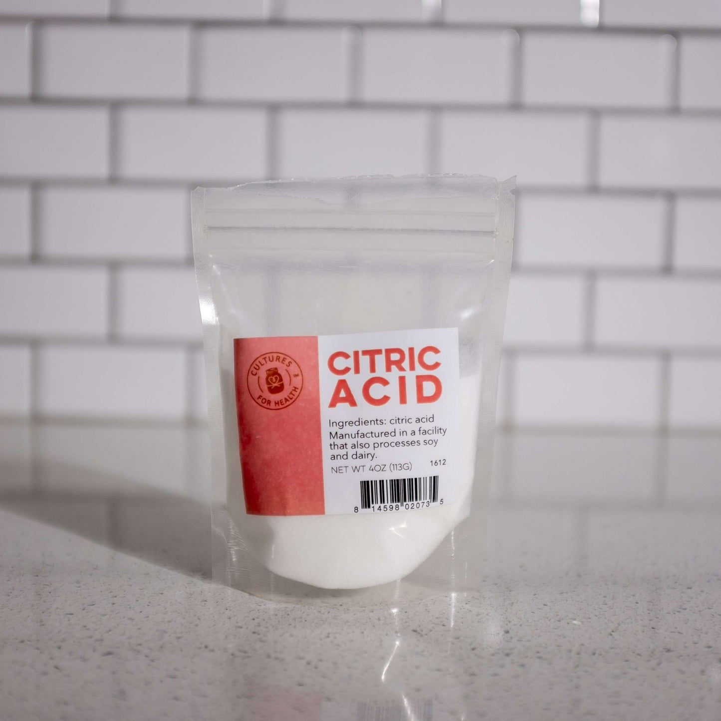 Granulated citric acid for topping popcorn